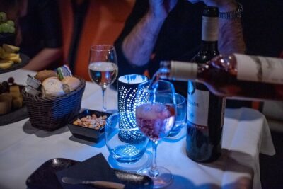 Amsterdam Wine and Cheese Guided Evening Cruise - The boat setup: glass views, warm ride, and WiFi aboard