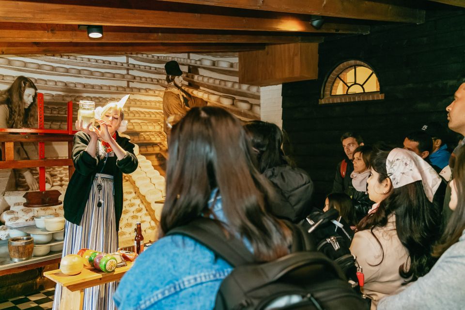 Amsterdam: Zaanse Schans windmills & Volendam Guided Tour - Clogs and Cheese: The Parts That Turn Sightseeing Into Real Culture
