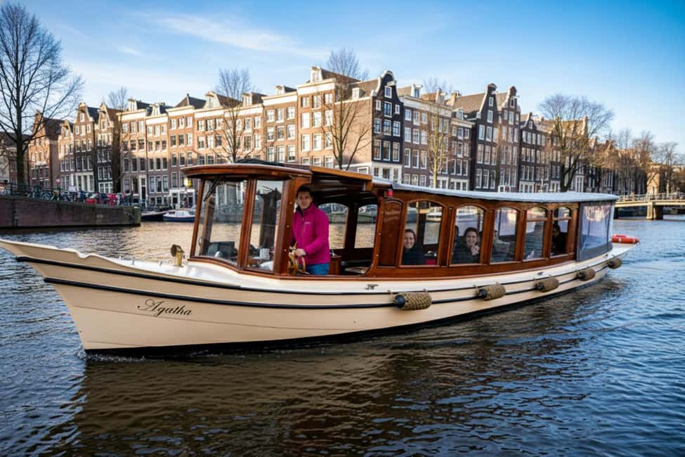 Amsterdam:1.5-Hour Canal Cruise local Guide, Drinks & Snacks - The vibe: small-group canals, snacks in hand