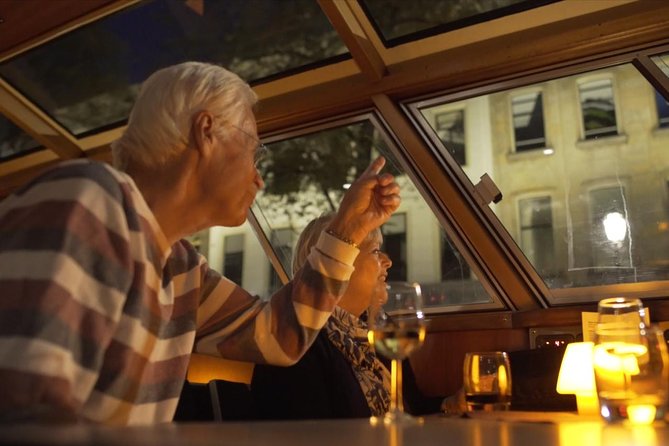 Evening Canal Cruise in Amsterdam with Wine & Cheese Option - IJ River and NEMO: A Modern Contrast on Classic Water