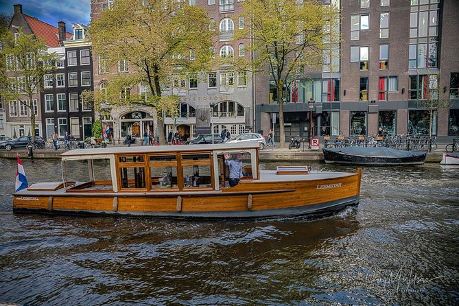 Exclusive Cruise! 90 min - 12 guests max - Book Leemstar! - A 1928 Electric Saloon Boat Makes the Canals Feel Personal