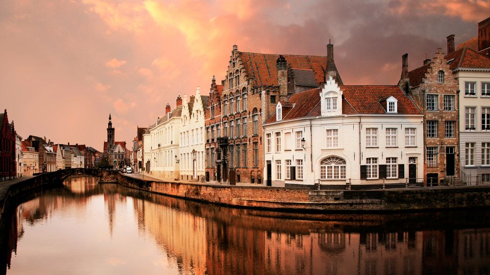 From Amsterdam: Bruges Day Trip in Spanish with Boat Option - Dijver canal views, Burg Square, and the Belfort at Grote Markt