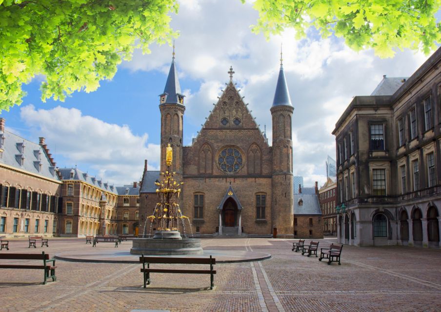 From Amsterdam: Rotterdam and The Hague Tour in Spanish - Rotterdam starts with remembrance: The Man without a Heart