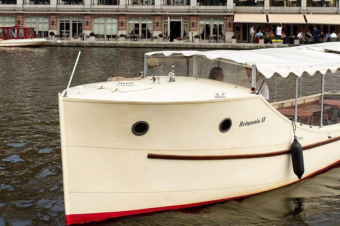 Guided Amsterdam Canal Cruise – Snacks & Drinks on board(1 Hour) - Why the small boat matters: hidden canals and close-up UNESCO views