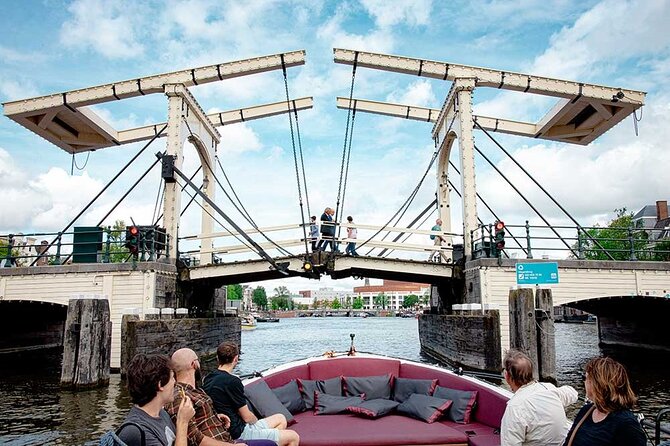 Guided Amsterdam Canal Cruise – Snacks & Drinks on board(1 Hour) - Stop 1: the oldest part of Amsterdam, where the streets feel ancient