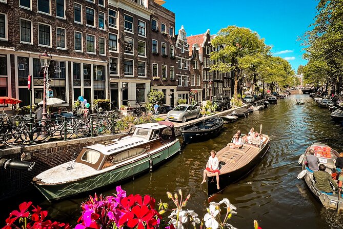 Humans of Amsterdam: Cultural Walking Tour incl. meeting 2 locals - Paradox Coffeeshop: Cannabis Culture Explained by Ludo