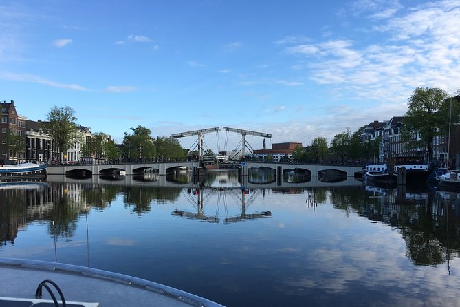 Morning Canal Cruise Amsterdam in Small-Group - What You’ll Likely See: Canal Houses, Bridges, and City Meaning