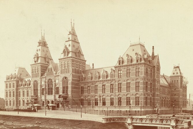 Rijksmuseum Amsterdam Semi-Private Guided Tour - Where you meet: Rijksmuseum archway and the orange school sign
