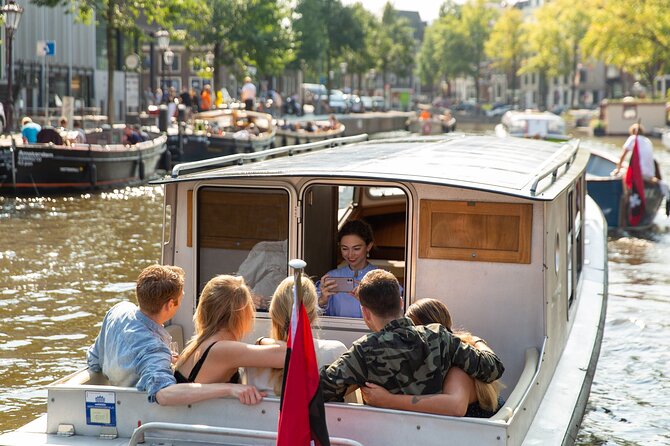 Small Group Boutique All-Inclusive Tour (max 12 p) With Captain - Singel to the Canal Belt: Jordaan flower streets and the feel of old Amsterdam