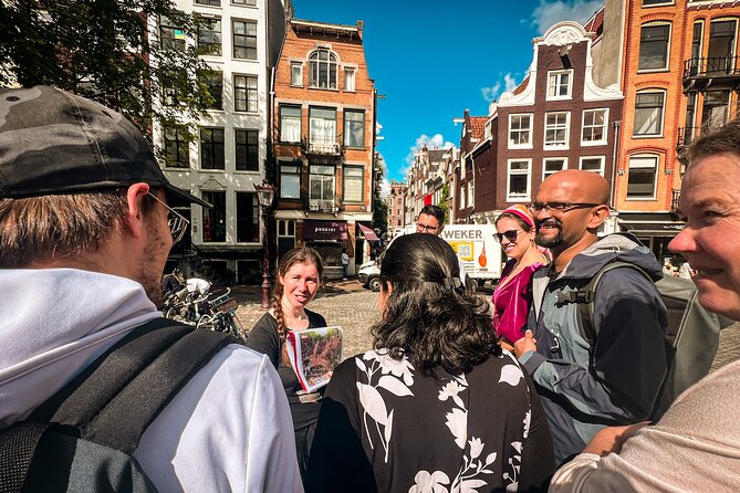 Small Group Walking Tour - Hello Amsterdam - Torensluis to Keizersgracht: UNESCO Canals, Slavery Memory, and Family Life