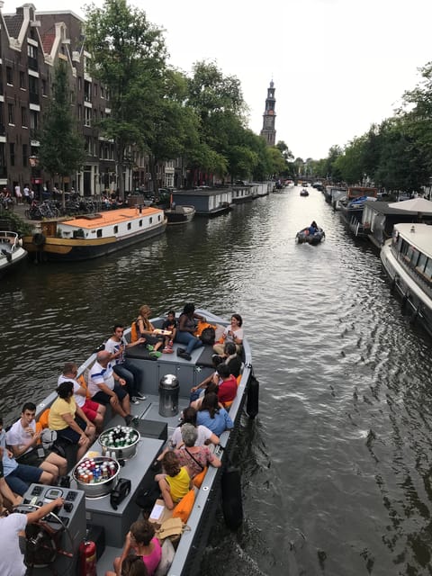 Visit Amsterdam by Boat with a French Guide (french) - Why this cruise feels more personal than a big-boat loop