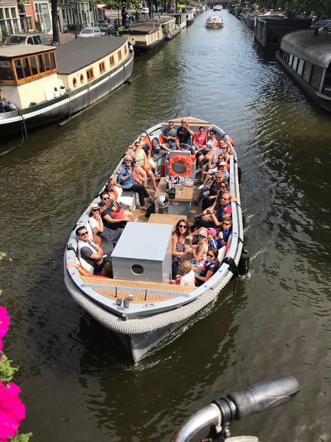 Visit Amsterdam by Boat with a French Guide (french) - Key highlights