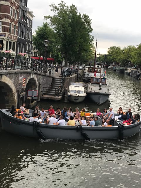 Visit Amsterdam by Boat with a French Guide (french) - The 90-minute canal route, stop by stop