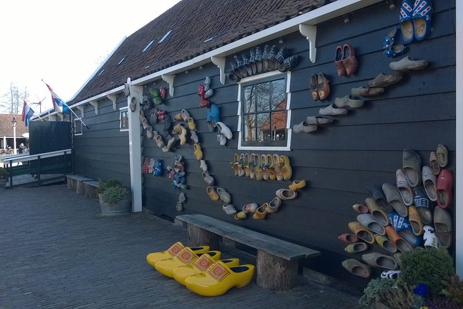 Zaanse Schans Windmills, Clogs and Dutch Cheese Small-Group Tour from Amsterdam - Kooijman Souvenirs & Clogs workshop: live clog making